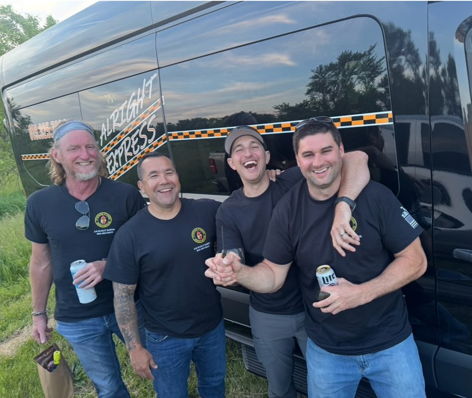 Veterans gathered casually together after reconnecting